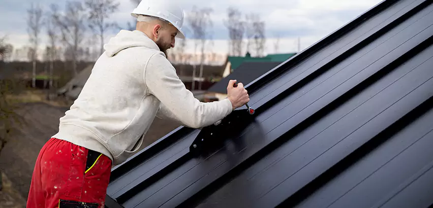 Tin Roof Ridge Cap Installation in Hampshire